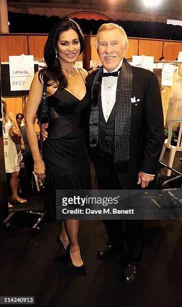 Winnie Forsyth and actor Bruce Forsyth pose backstage at the Fashion For Relief Japan Fundraiser benefiting the Japanese Red Cross in aid of those...