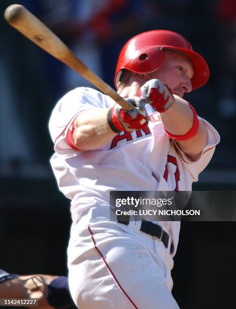 Anaheim Angels' Darin Erstad follows through on the tying RBI single against the New York Yankees in the fifth inning of Game Four of the American...