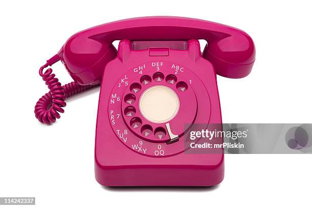 fuchsia dial style corded desk phone - pink retro phone stock pictures, royalty-free photos & images