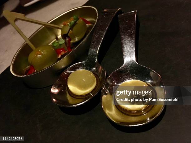 close-up of spherical olives - gastronomia molecular imagens e fotografias de stock