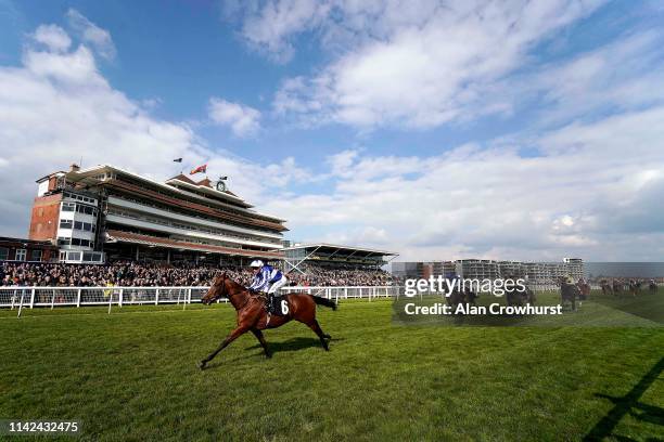 Silvestre De Sousa riding Fox Chairman wins The Dubai Duty Free Tennis Championships Maiden Stakes at Newbury Racecourse on April 13, 2019 in...