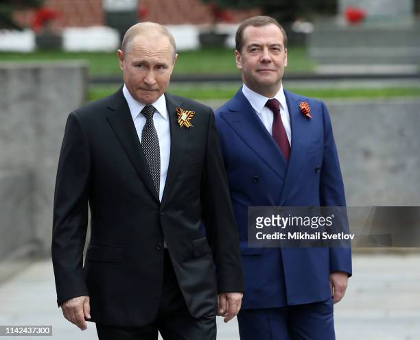 Russian President Vladimir Putin and Prime Minister Dmitry Medvedev arrive to the Red Square Victory Day Parade, May 9, 2019 in Moscow, Russia. Putin...