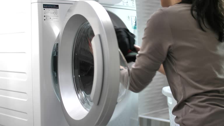 1,811 Woman Doing Laundry Washing Machine Stock Videos, Footage, & 4K ...