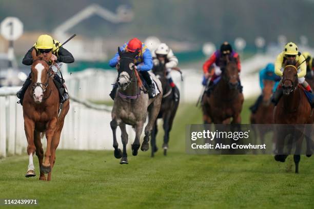 Oisin Murphy riding Raise You win The Dubai Duty Free Tennis Championships Maiden Stakes at Newbury Racecourse on April 13, 2019 in Newbury, England.