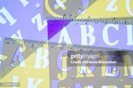 Yellow Ruler Letters Purple And Yellow Alphabet Stencil Rulers High-Res Stock Photo - Getty ...