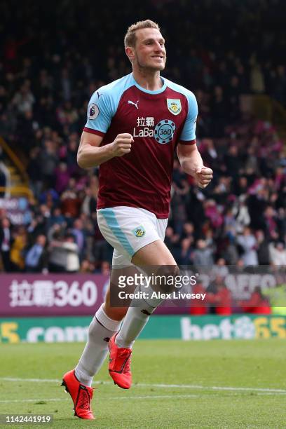 Chris Wood of Burnley celebrates after scoring his team's second goal during the Premier League match between Burnley FC and Cardiff City at Turf...