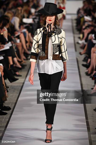 Model walks the runway during the Oscar de la Renta 2012 Resort Collection show at a Private Studio on May 16, 2011 in New York City.