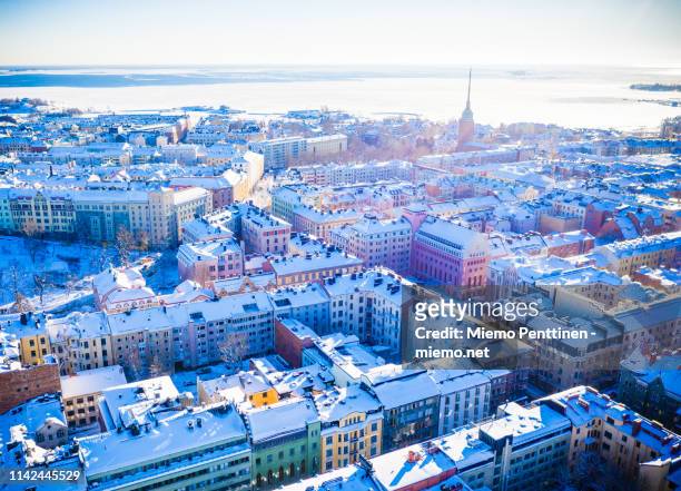 aerial view over helsinki on a sunny winter day - helsinki foto e immagini stock