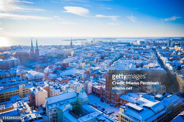 aerial view over helsinki on a sunny winter day - helsinki foto e immagini stock