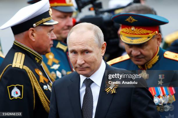 Russian President Vladimir Putin attends a Victory Day military parade marking the 74th anniversary of the victory over Nazi Germany in the 1941-1945...