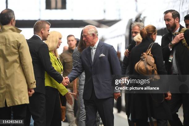May 2019, Saxony, Leipzig: The British heir to the throne Prince Charles and his wife Camilla visit Leipzig on the second day of their trip to...
