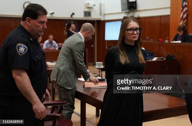 Fake German heiress Anna Sorokin is led away after being sentenced in Manhattan Supreme Court May 9, 2019 following her conviction last month on...