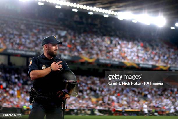 General view of a police officer on the pitch during the UEFA Europa League, Semi Final, Second Leg at the Camp de Mestalla, Valencia.