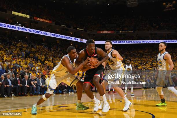 Clint Capela of the Houston Rockets handles the ball against the Golden State Warriors during Game Five of the Western Conference Semifinals of the...