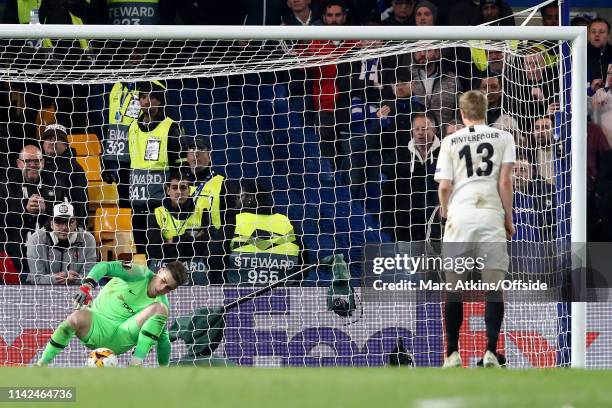 Kepa Arrizabalaga of Chelsea saves a penalty from Martin Hinteregger of Eintracht Frankfurt during the UEFA Europa League Semi Final Second Leg match...