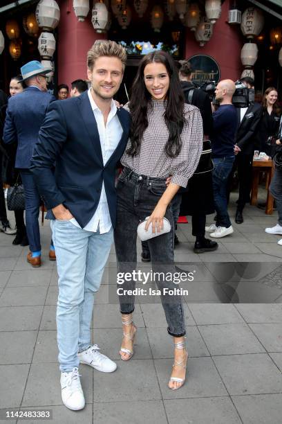 German actor Joern Schloenvoigt and his wife Hanna Weig attend the Umami Opening on May 9, 2019 in Berlin, Germany.