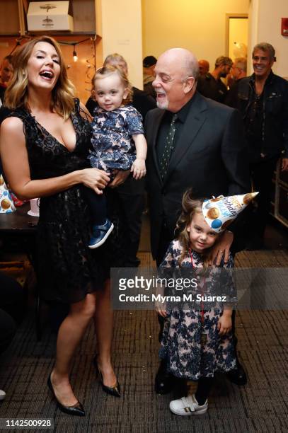 Alexis Joel and Billy Joel celebrate with their daughters Remy Anne Joel and Della Joel backstage on Joel's 70th Birthday and his 64th consecutive...
