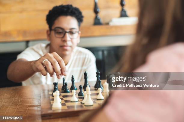 playing chess at home - chess championship stock pictures, royalty-free photos & images