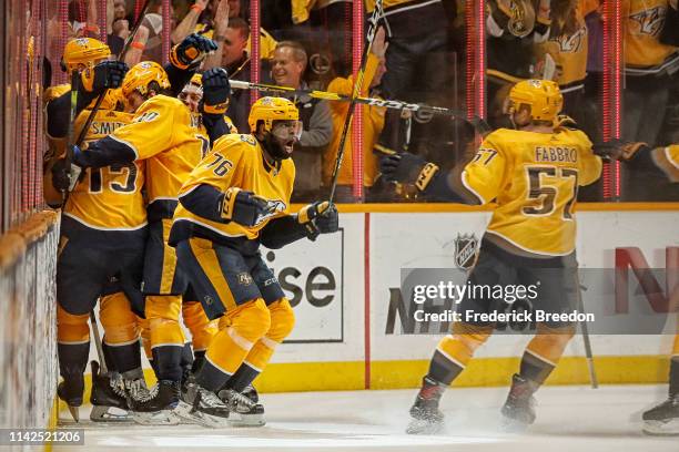 Subban of the Nashville Predators celebrates with teammate Dante Fabbro of the Nashville Predators after scoring the game-winning goal in the first...