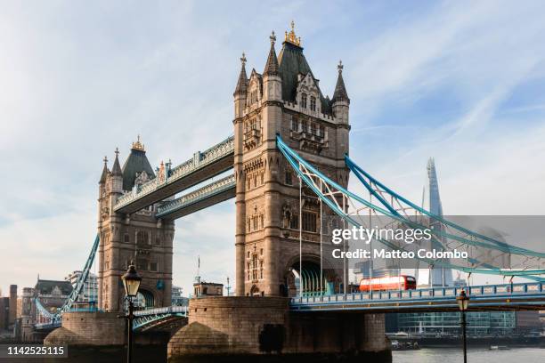 tower bridge with red bus and the shard, london, uk - tower bridge imagens e fotografias de stock