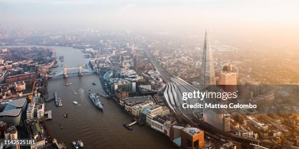 aerial panoramic of the shard and tower bridge, london - guildhall london stock pictures, royalty-free photos & images