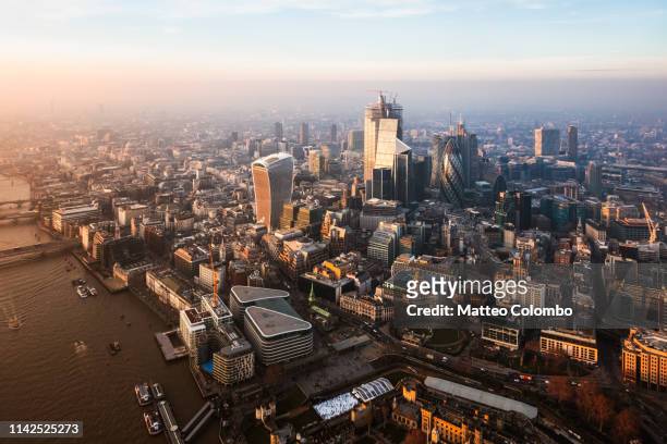 aerial view of the city at sunset, london, united kingdom - london und umgebung stock-fotos und bilder
