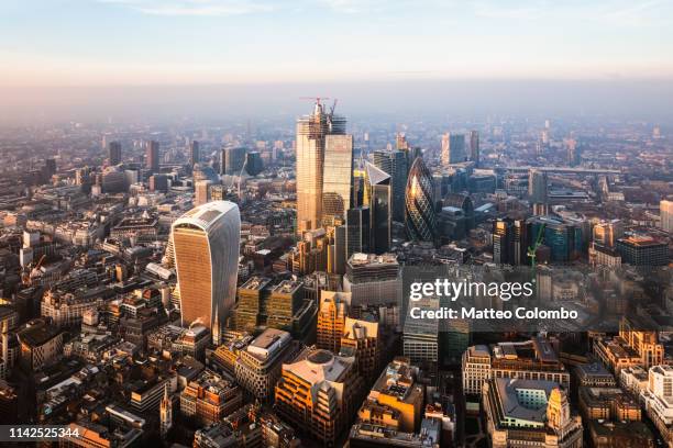 aerial view of the city of london at sunset, england - centro de londres fotografías e imágenes de stock