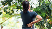 Young Asian women with back pain, health care concept