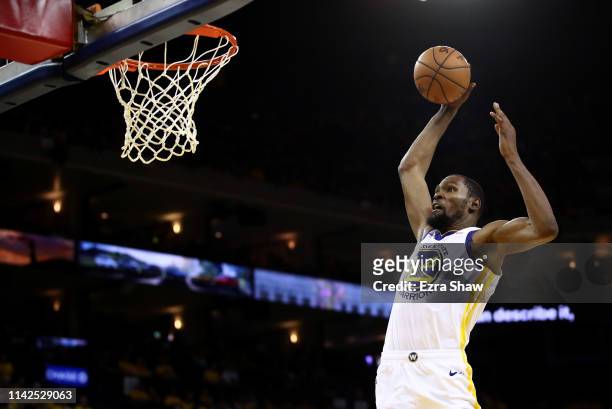 Kevin Durant of the Golden State Warriors goes up for a dunk against the LA Clippers during Game One of the first round of the 2019 NBA Western...