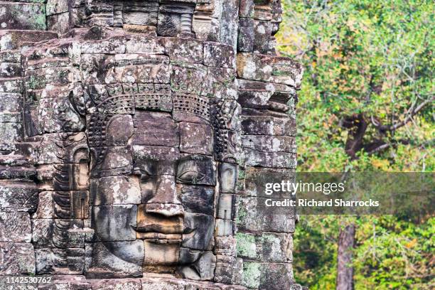 bayon temple towers and faces - empire stock pictures, royalty-free photos & images