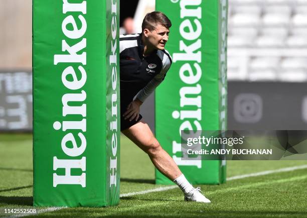 Saracens' English scrum-half Richard Wigglesworth attends the captain's run training session at St James' Park stadium in Newcastle-upon-Tyne, north...