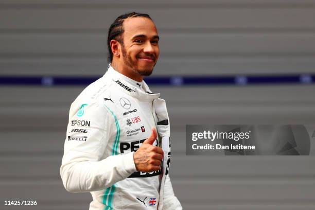 Race winner Lewis Hamilton of Great Britain and Mercedes GP celebrates in parc ferme during the F1 Grand Prix of China at Shanghai International...