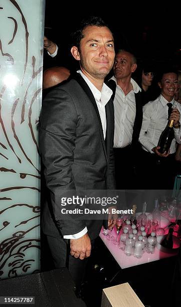 Actor Jude Law attends the Jalouse Fashion for Relief Japan Fundraiser after party hosted by model Naomi Campbell at Baoli Restaurant and Club during...