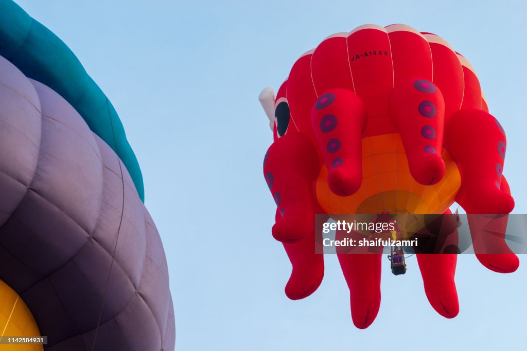 Morning view with hot balloons over lake Putrajaya, Malaysia.