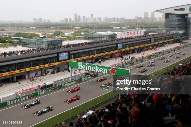 Lewis Hamilton of Great Britain driving the Mercedes AMG Petronas F1 Team Mercedes W10, Valtteri Bottas driving the Mercedes AMG Petronas F1 Team...