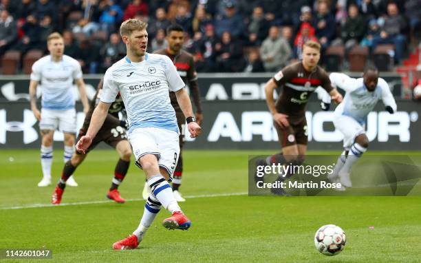 Fabian Klos of Arminia Bielefeld scores his team's first goal from a penalty during the Second Bundesliga match between FC St. Pauli and DSC Arminia...