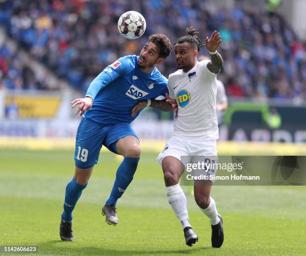 Ishak Belfodil of Hoffenheim is challenged by Valentino Lazaro of Berlin during the Bundesliga match between TSG 1899 Hoffenheim and Hertha BSC at...