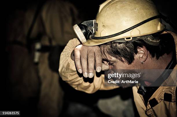 tired miner after work - miner helmet portrait stock pictures, royalty-free photos & images