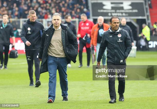 Jos Luhukay, Head Coach of FC St. Pauli and Andreas Rettig, interim sporting director FC St. Pauli look on dprior to the Second Bundesliga match...