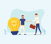 The man is holding a huge light bulb and shaking hands with a businessman with briefcase. Startup and search investments