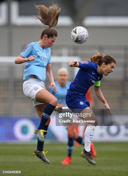 Abbie McManus of Manchester City Women challenges Karen Carney of Chelsea Women for a high ball during the Women's FA Cup Semi Final match between...