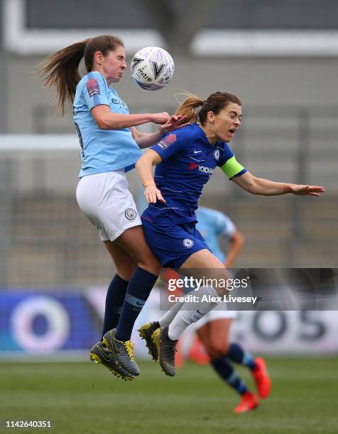 Abbie McManus of Manchester City Women challenges Karen Carney of Chelsea Women for a high ball during the Women's FA Cup Semi Final match between...