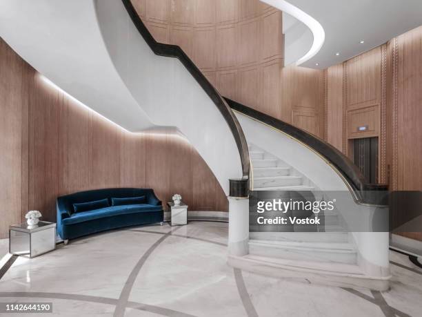 spiral staircase in a luxury jewelry store - luxury mansion interior stock pictures, royalty-free photos & images