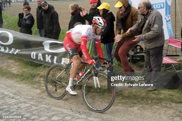 Racers ride the cobblestones sector 9 of Pont Thibaut during the 117th Paris - Roubaix 2019 race from Compiegne to Roubaix on April 14, 2019 in...