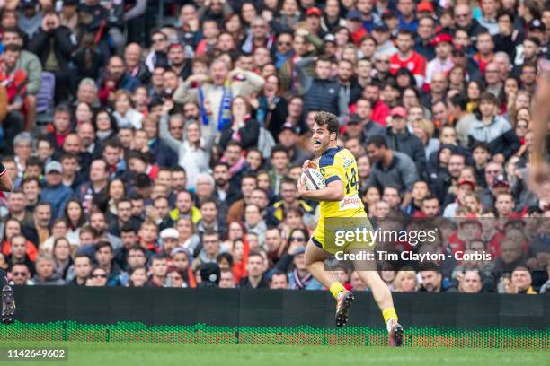 April 14: Damian Penaud of Clemont races away for a second half try during the Stade Toulouse Vs Clermont Auvergne, Top 14 Regular Season match at...