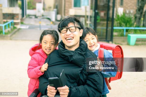 japanese father on the wheelchair and daughter - 逆境 stock pictures, royalty-free photos & images