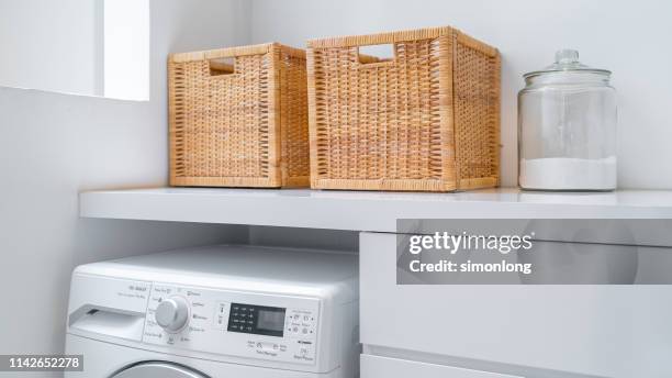 household washing machine - washing basket stock pictures, royalty-free photos & images