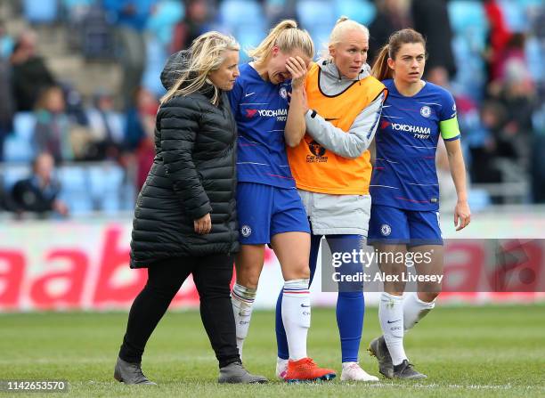 Magdalena Eriksson of Chelsea Women is consoled by Emma Hayes the manager of Chelsea Women after scoring an own goal to hand victory to Manchester...