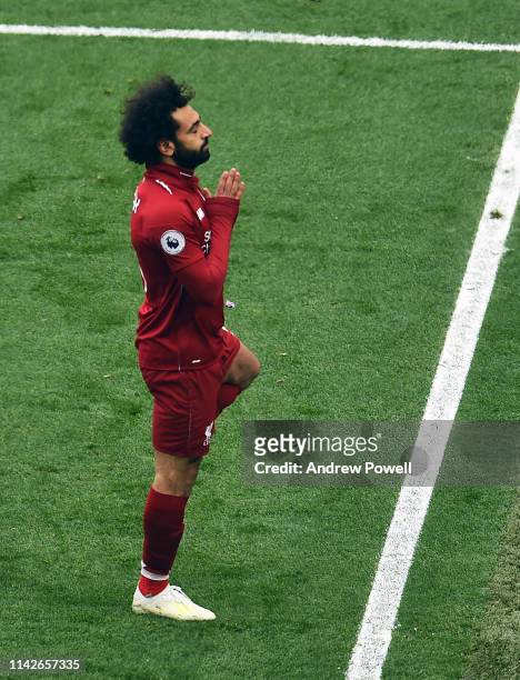 Mohamed Salah of Liverpool scores the first goal and celebrates during the Premier League match between Liverpool FC and Chelsea FC at Anfield on...