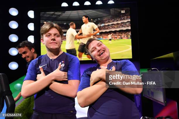 Corentin 'MAESTRO' Thullier of France and Lucas 'DaXe' Cuillerier of France celebrates after winning the tournament during Day 2 of FIFA eNations Cup...